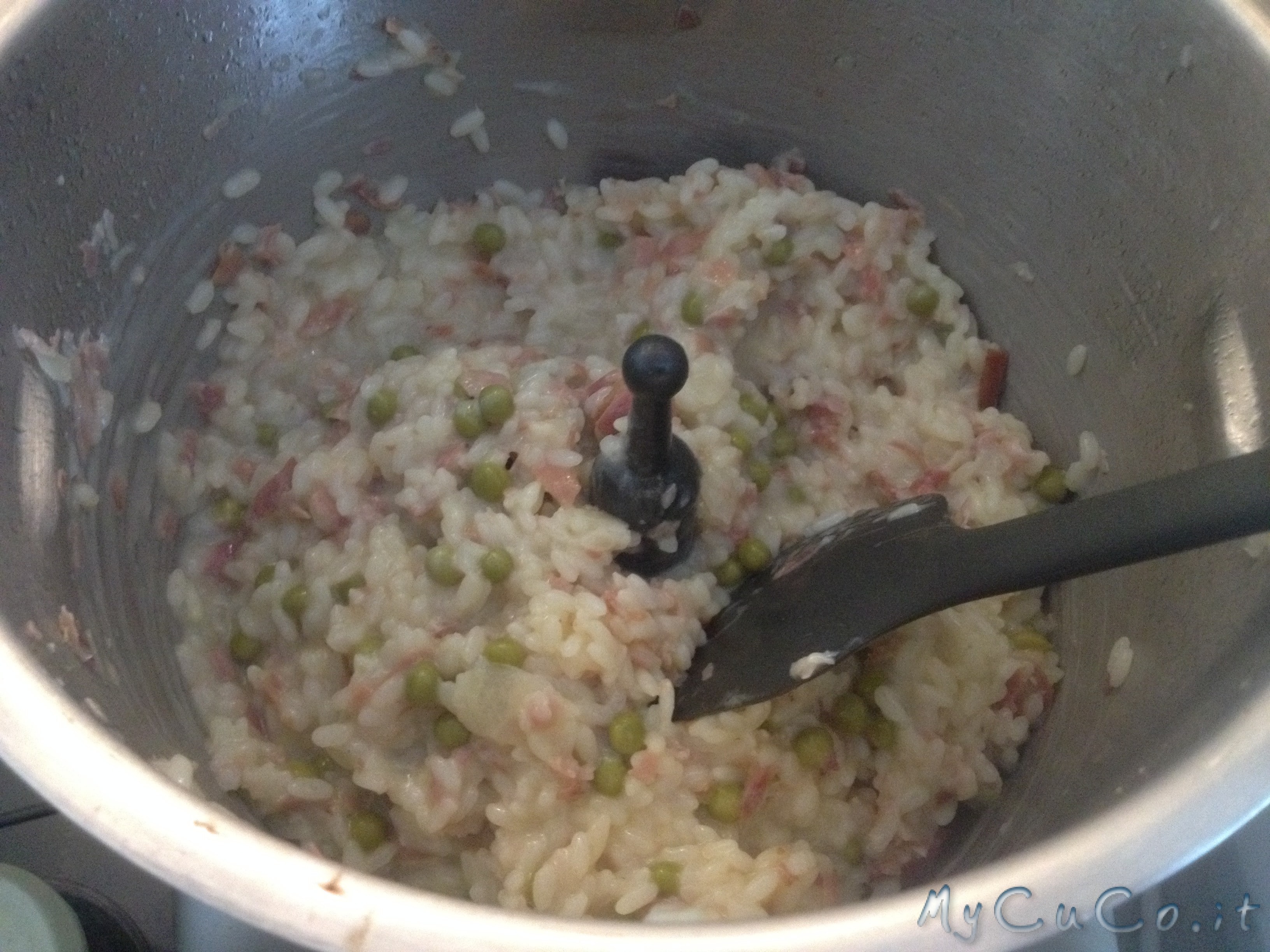 Risotto speck, pisellini e sottilette